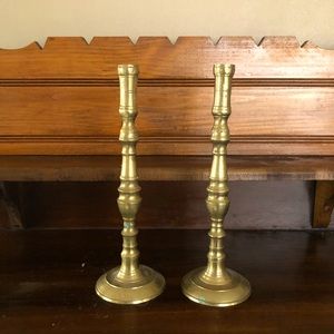 Brass candle stick holder pair.